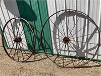 2 steel implement wheels. 53” across