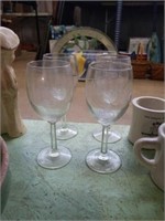 Group of 4 etched navy wine glasses