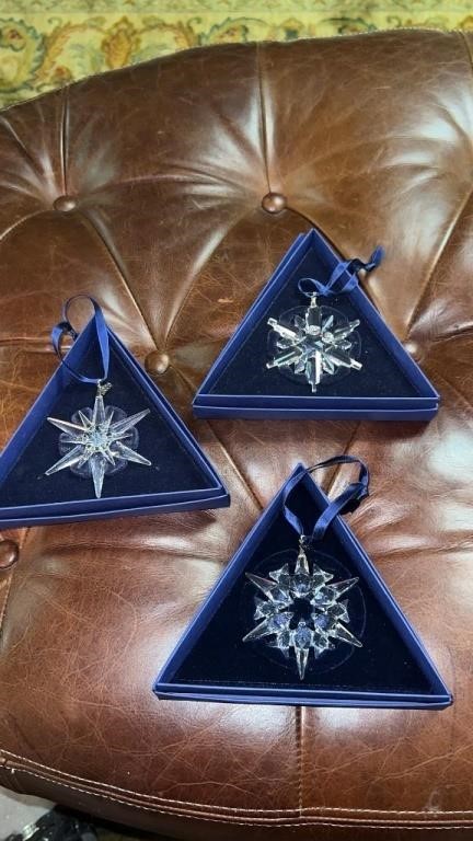 5 Swarovski Christmas ornaments.