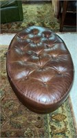 Oval ottoman approximately 43.5” wide x 18” No