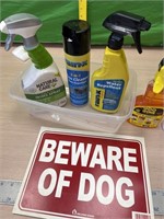 Flea spray, glass cleaner goo gone beware of dog