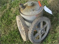 1586) 2 Metal gas cans & 2 mower wheels