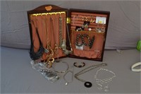 144: Costume jewelry earring/necklace sets w/ case