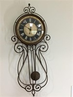 Sterling & Noble metal wall clock.  28” long x