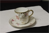 A Limoge Dematesse Cup And Saucer
