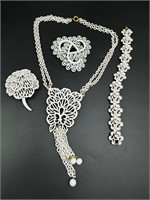 Vintage white enamel Trifari jewelry set and more