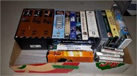 FLAT OF ASSORTED VHS MOVIES AND CASSETTE TAPES