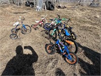 Assorted tricycles and kids pedal bikes