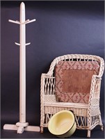 A wicker potty chair with a yellow enameled pot
