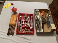 Silverware, knives, kitchen items.