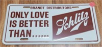 ONLY LOVE IS BETTER THAN...  SCHLITZ LICENSE PLATE