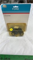 Ford 1/64 scale model tractor.