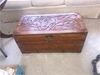 Carved wood trunk