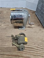 Vintage pencil sharpener and brass U.S lock