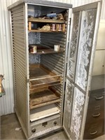 Old hot box used for storage 70” tall x 20” wide