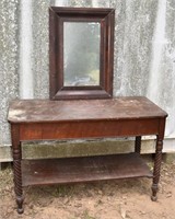 Mahogany single drawer console table and ogee wall