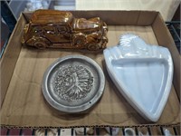 Group of vintage ashtrays native american car