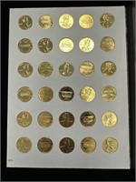 90 gold plated cents in book