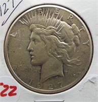 1927 Peace silver dollar.