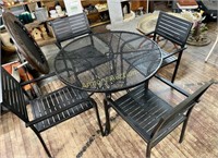 WROUGHT IRON PATIO TABLE W/ FOUR CHAIRS