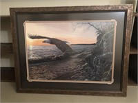 Eagle flying over ocean framed print 27"x35"
