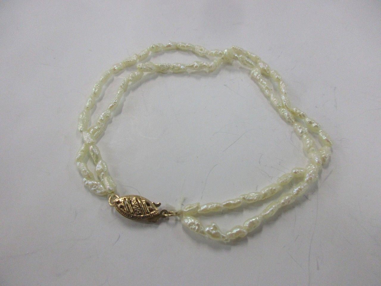 14k gold double strand pearl bracelet