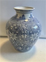 Ceramic vase measures 11 inches