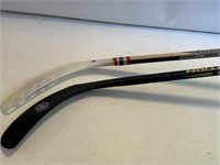 2- hockey sticks right handed