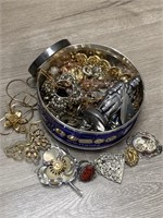 Costume Jewelry In Tin