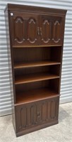 Wood book case open middle 4 doors 
34” wide 16”