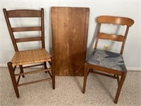 Pair of wooden chairs with small folding table