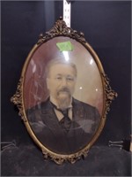 Vintage glass bubble framed portrait of a man
