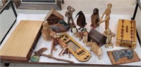 Large box full of wooden items includes penguins,
