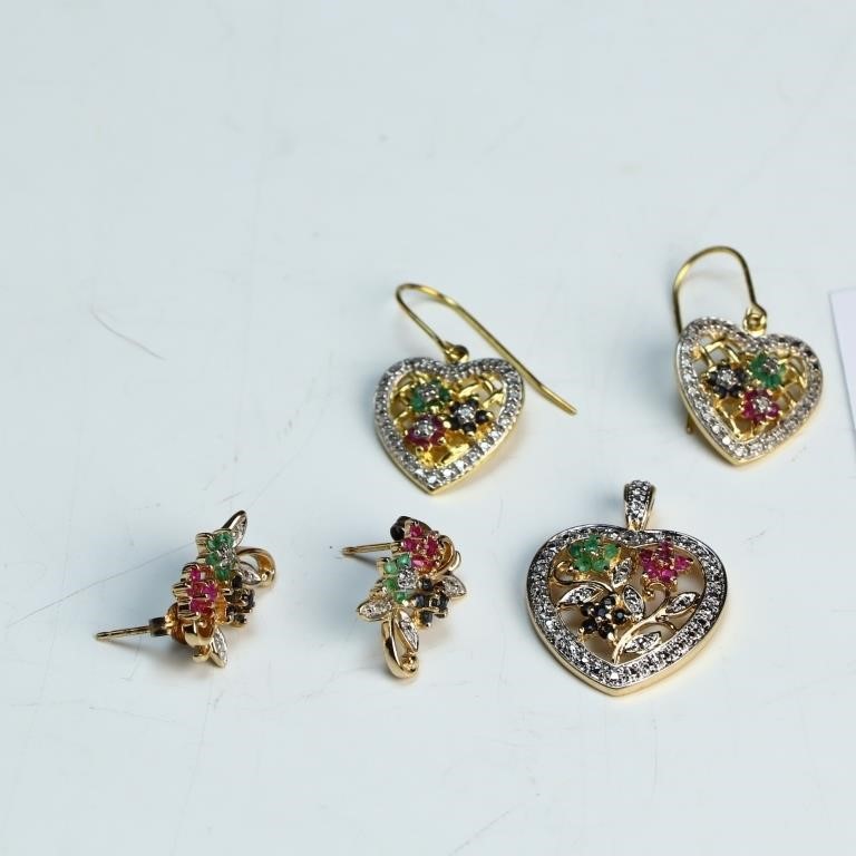 Two sterling silver pairs of earrings and a matchi