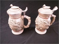 Pair of Avon lidded beer steins decorated