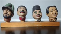 Unusual Display of 4 Dictator Bottle Stoppers