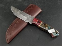 Damascus bladed knife with wood and Kirinite  scal