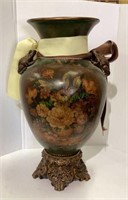 Urn style vase with floral motif and frog