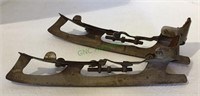 Vintage ice skates - strap on to your own shoes.