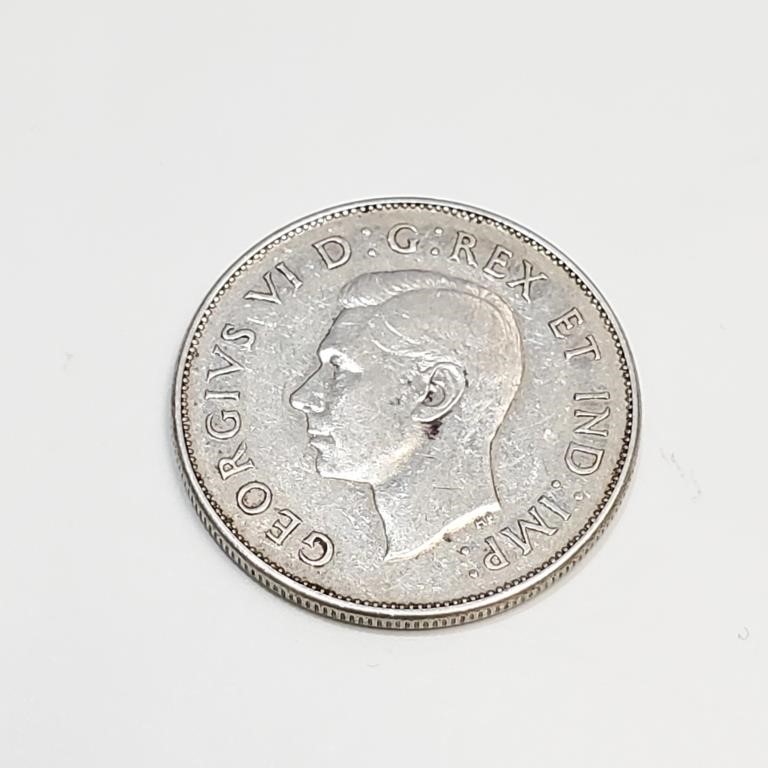 $80 11.66g  Silver 1945 Canadian 50 Cent Coin