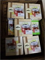 9 boxes of Kerr regular mouth lids