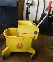 Commercial mop bucket on casters