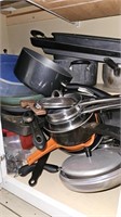 Contents of drawer and bottom cabinet- Pots and