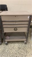Napa toolbox with drawers and top lid opens , on