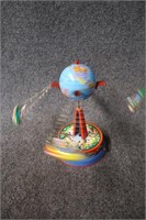 Globe Ride Tin Toy