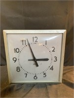 Standard vintage school clock mounts to wall