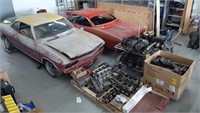 Two Corvairs partially prepared for restoration.