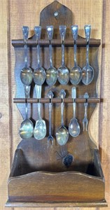 Antique spoon collection with display rack
