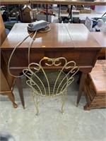 Chair and vintage singer sewing machine