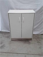 White storage cabinet 32in tall 24 in length